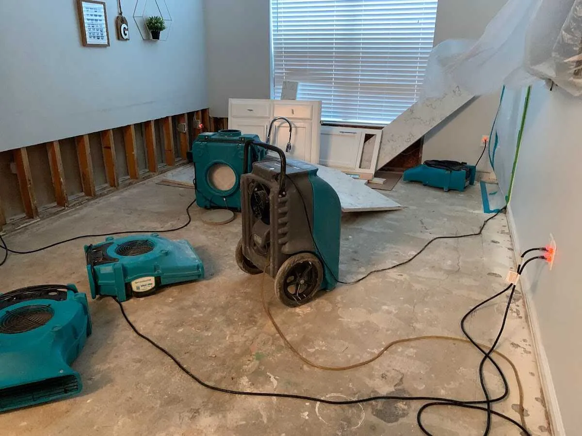 Dehumidifier in flood-cut room for Water Damage Restoration in York
